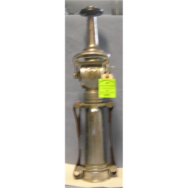 Antique fire nozzle by Elkhart brass company