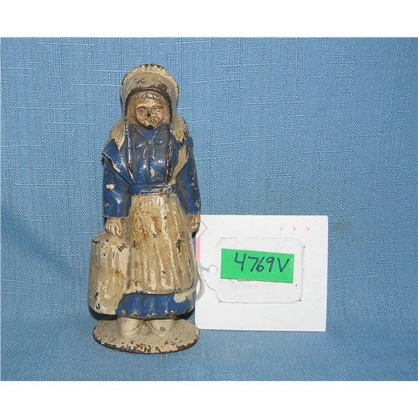 Amish woman hand painted cast iron paper weight