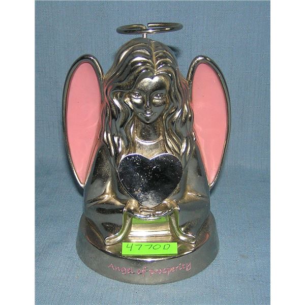 Cast metal angel of prosperity savings bank