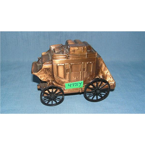 Antique copper toned stage coach coin bank