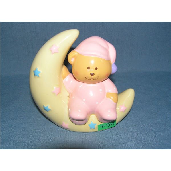 Baby Bear sitting on the moon bank