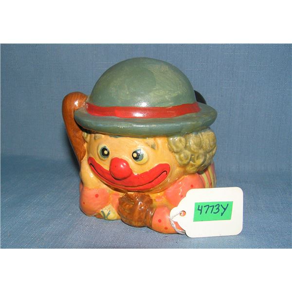 Hand painted clown with baseball bat and glove bank,