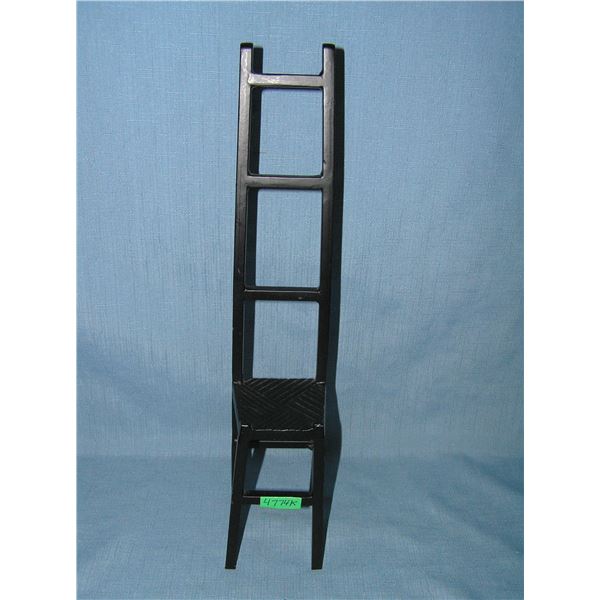 Cast iron ladder back chair decorative piece