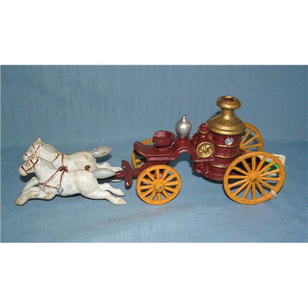 Cast iron horse drawn fire pumper