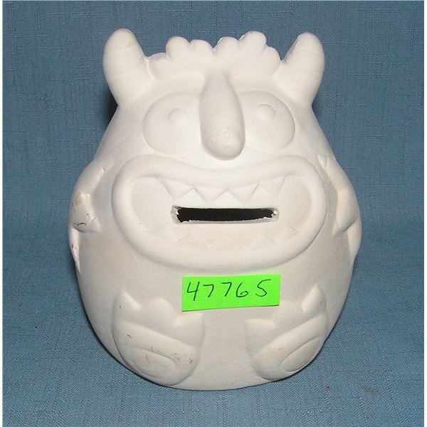 Unusual creature earthen ware bank