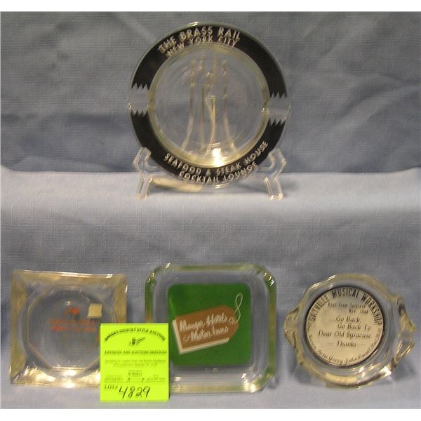 Group of four vintage advertising ash trays