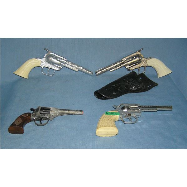 Group of vintage western themed cap guns