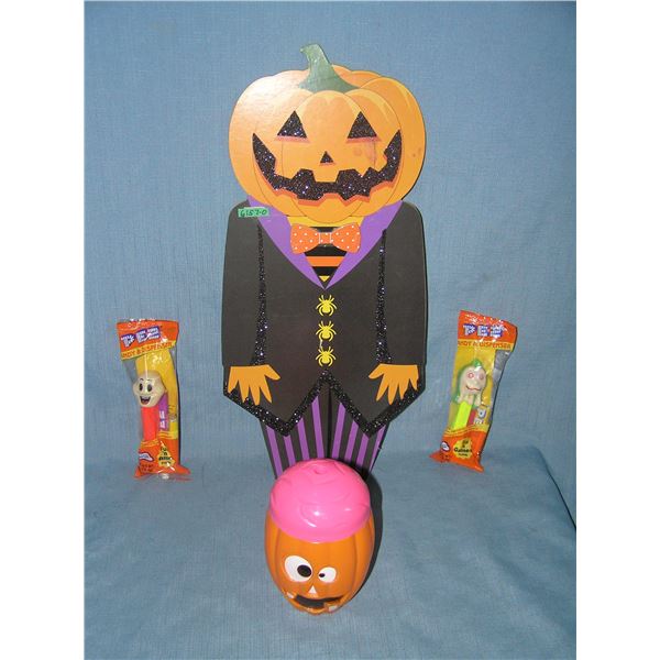 Group of 4 Halloween decorations including PEZ