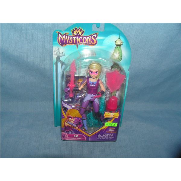 Mysticon's Em action figure mint on card