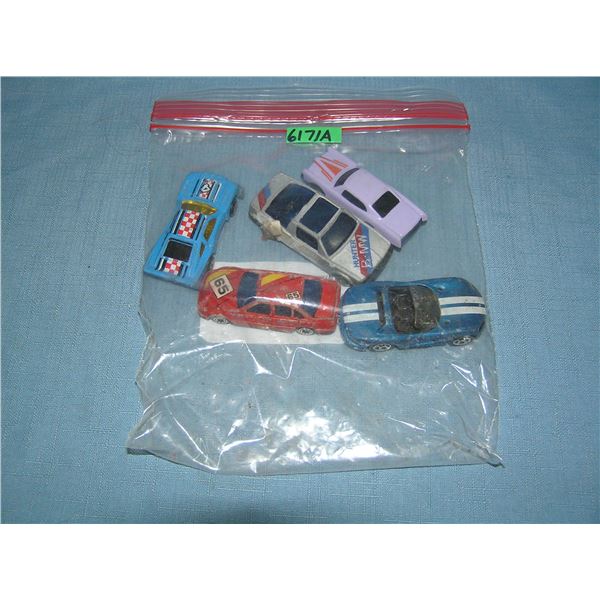 Bag lot of vintage die cast vehicles
