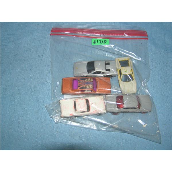 Bag lot of vintage die cast vehicles