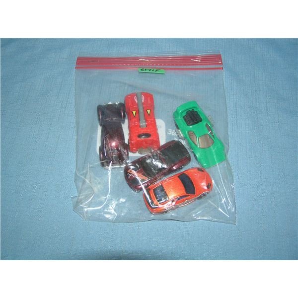 Bag lot of vintage die cast vehicles