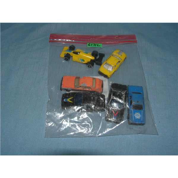 Bag lot of vintage die cast vehicles