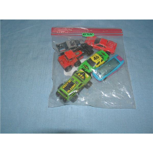 Bag lot of vintage die cast vehicles