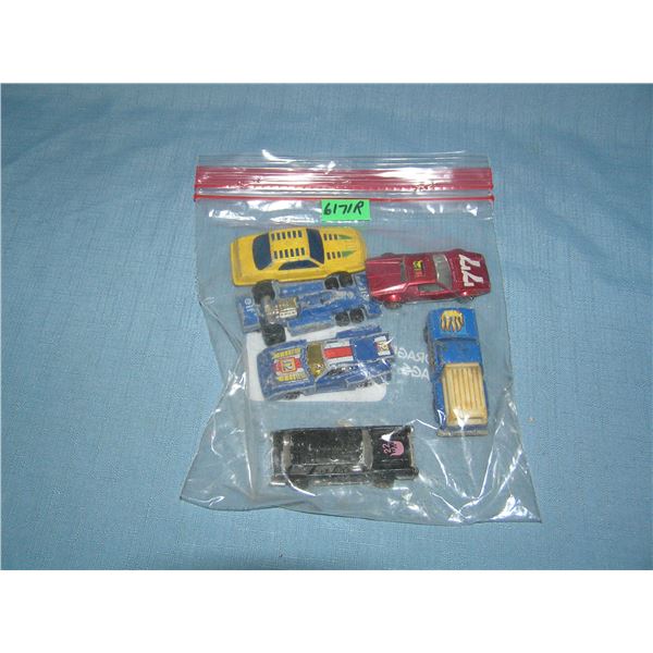 Bag lot of vintage die cast vehicles