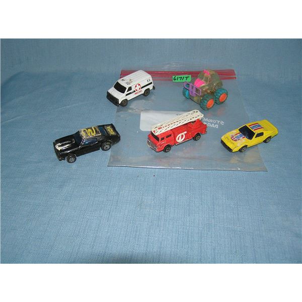 Bag lot of vintage die cast vehicles