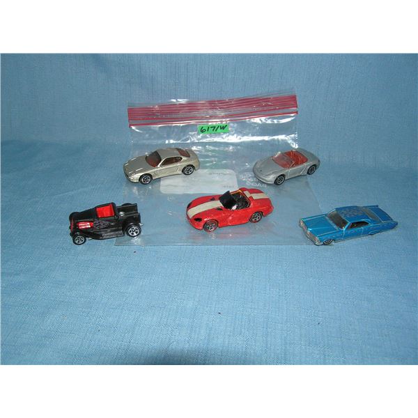 Bag lot of vintage die cast vehicles