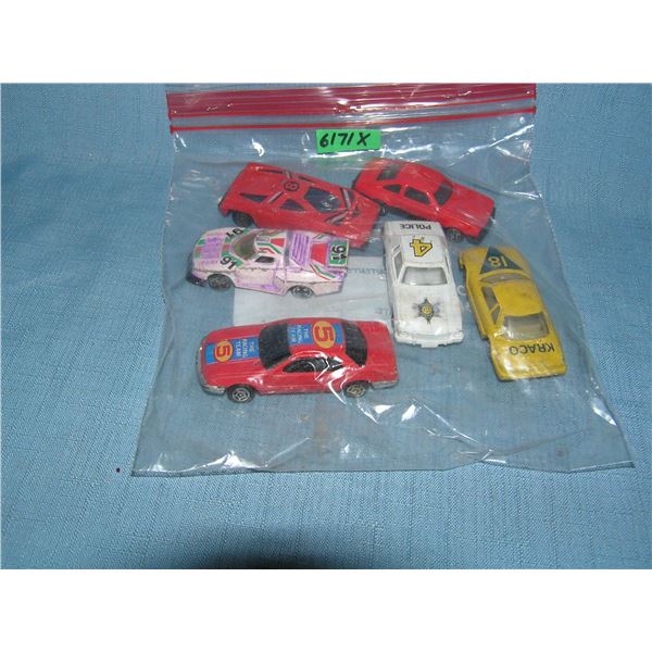 Bag lot of vintage die cast vehicles