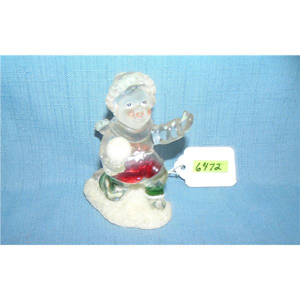 Colorized glass child figure with snowball
