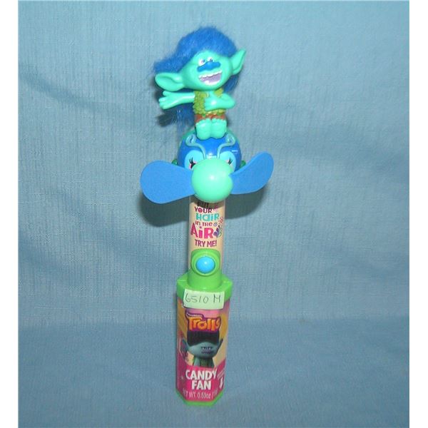 Trolls candy containers and fan toy from the movie Trolls