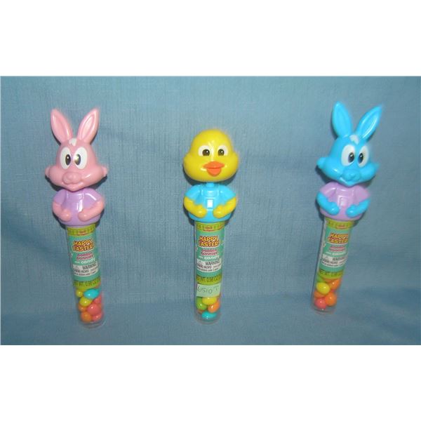 Group of 3 figural nodders / bobble heads candy containers