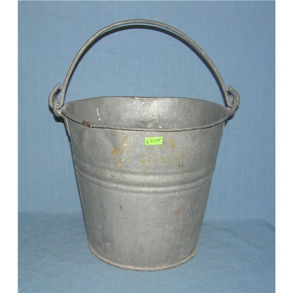 Antique metal farm house bucket
