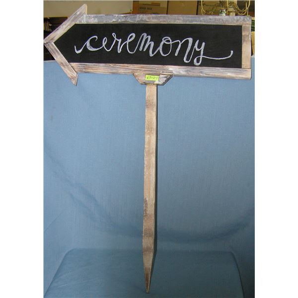 Ceremony stick in the ground arrow sign