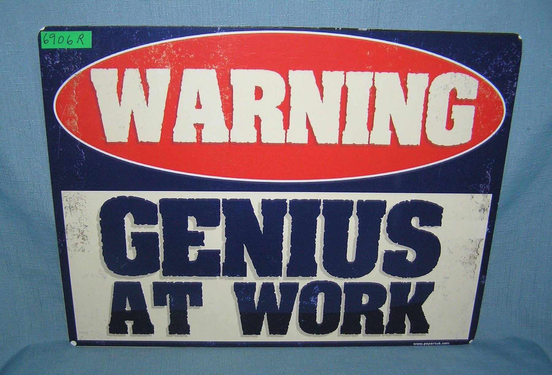 Warning: Genius at Work retro style advertising sign