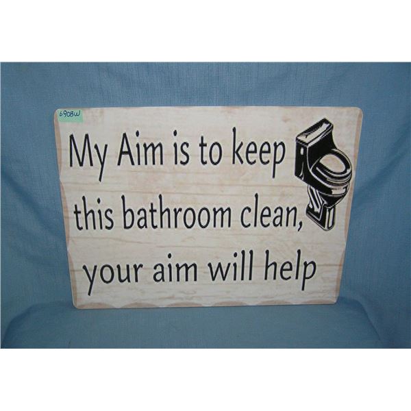 My aim is to keep this bathroom clean your aim will help retro style advertising sign