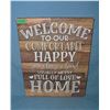 Image 1 : Welcome to our comfortable and happy home sign