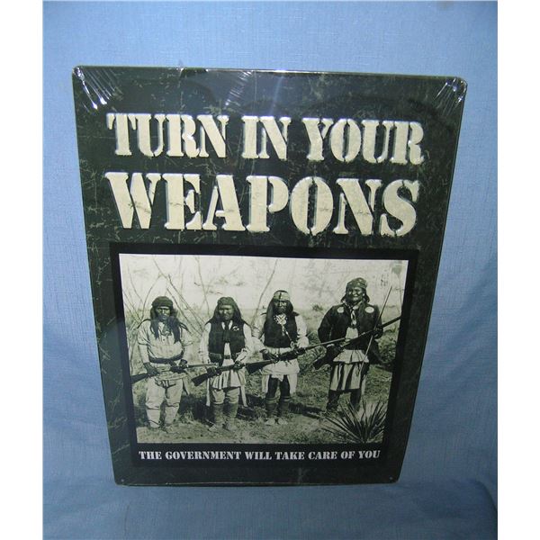 Turn in your weapons all tin advertising sign