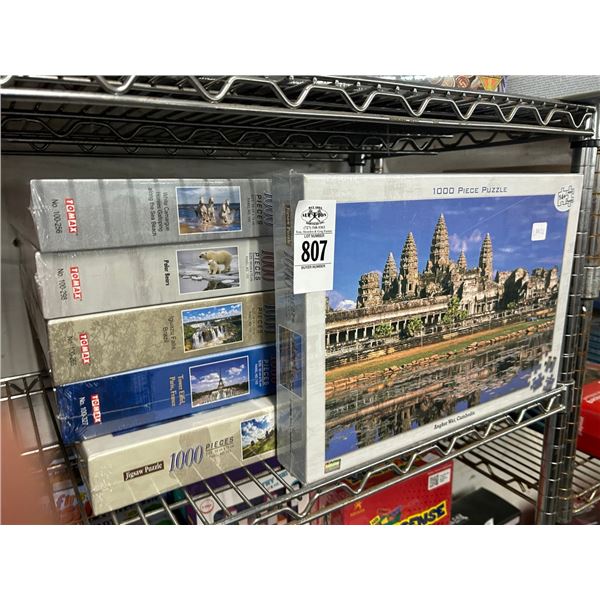 11-New 1000 Pc. Puzzle - 11 X $