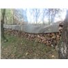 Image 1 : FireWood Oak and Tamarac Covered with Rubber Tarp 4x4x26