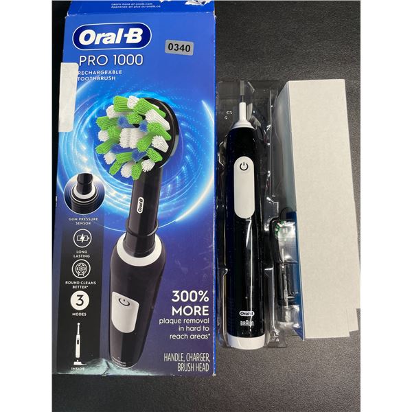 1 Oral-B Pro 1000 Rechargeable Electric Toothbrush - New