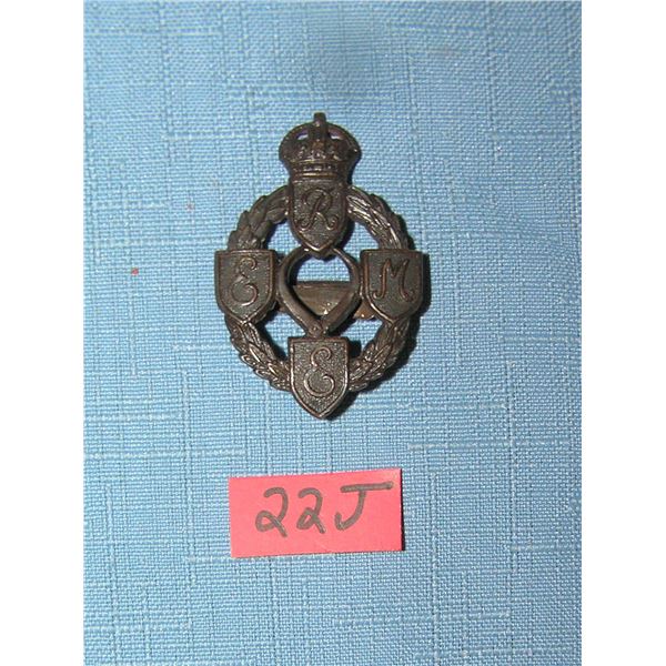 Antique brass British Army Corps badge