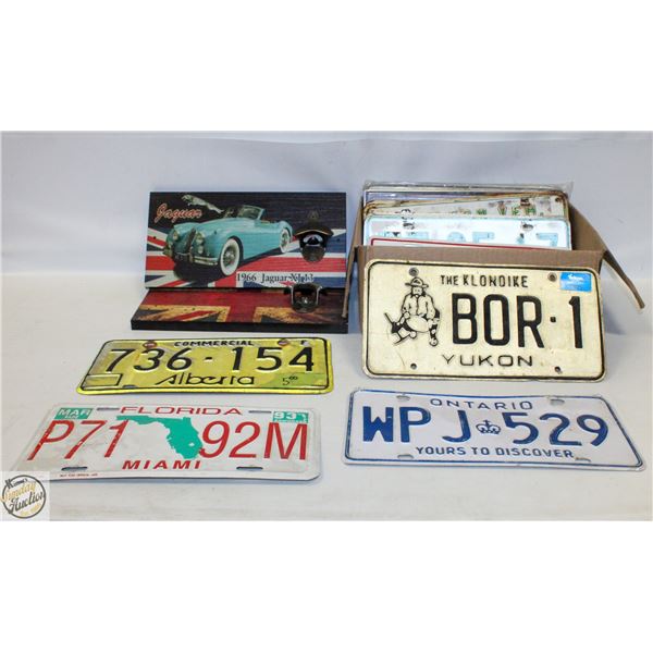 FLAT OF 21 COLLECTOR LICENSE PLATES & 2 BOTTLE
