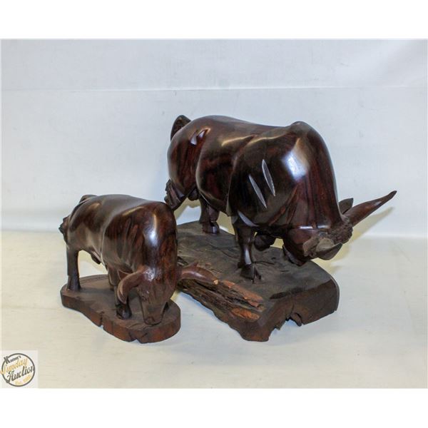 PAIR OF WOOD CARVED BUFFALO FIGURES - DARK FINISH