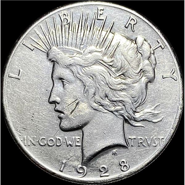 1928 Silver Peace Dollar NEARLY UNCIRCULATED