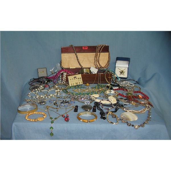 Large box of vintage and modern costume jewelry
