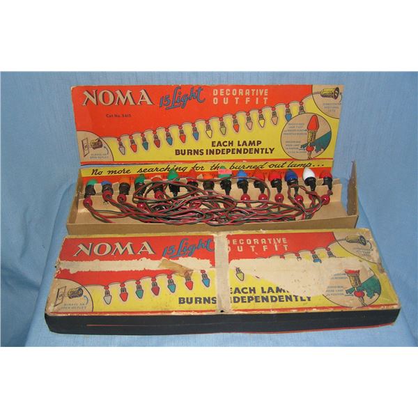 Box of antique Noma electric Christmas lights