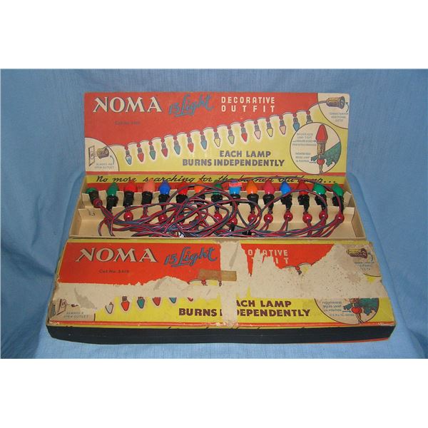 Box of antique Noma electric Christmas lights