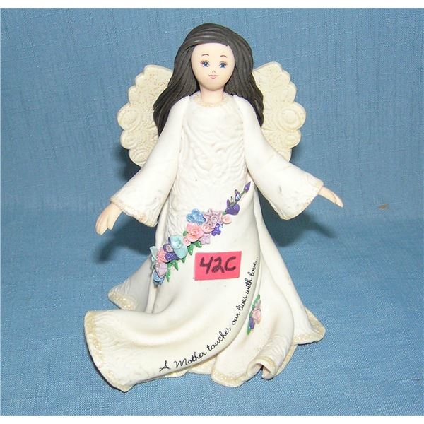 Mother kneeded angel figure
