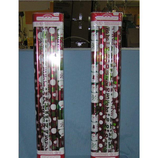 2 packages of Christmas wrapping paper
