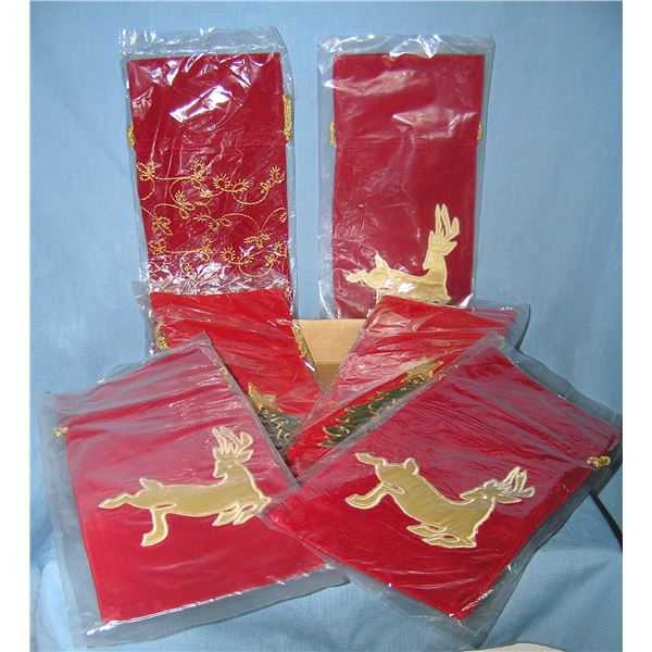 Nice box of felt and gold holiday gift bags or stockings
