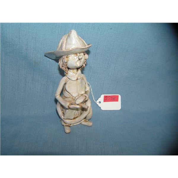Artist signed hand glazed clay fireman figure