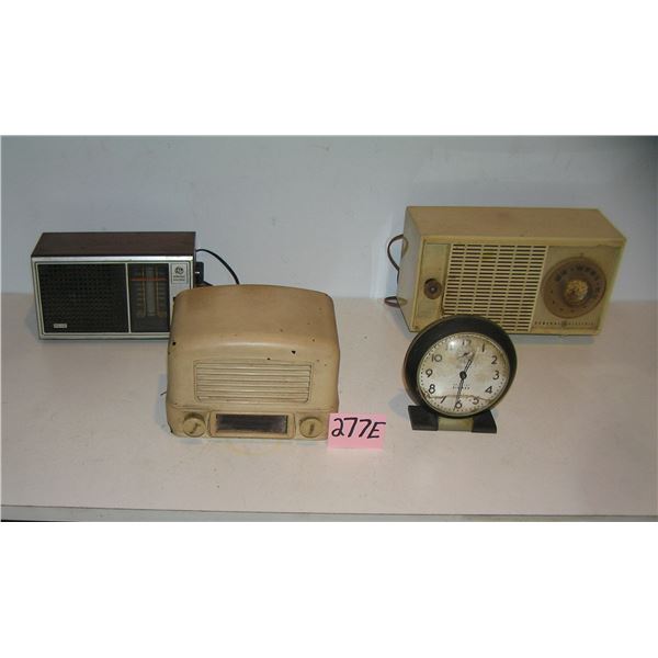 Group of old radios and a Big Ben alarm clock