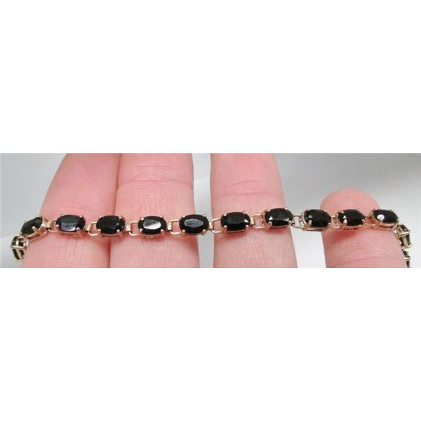 10 Kt Yellow Gold & Dark Oval Sapphire Bracelet - 7 1/4"