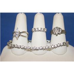Three Sterling Silver Rings One Bracelet