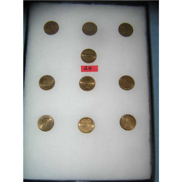 Collection of solid brass US state commemoratives