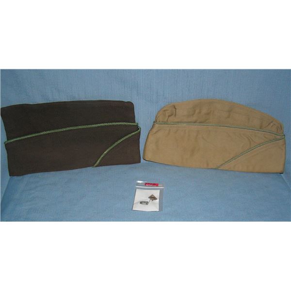 Pair of U.S. military overseas caps and a U.S. tank armored division badge
